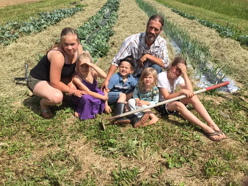 Jonah Powell and family in their garden